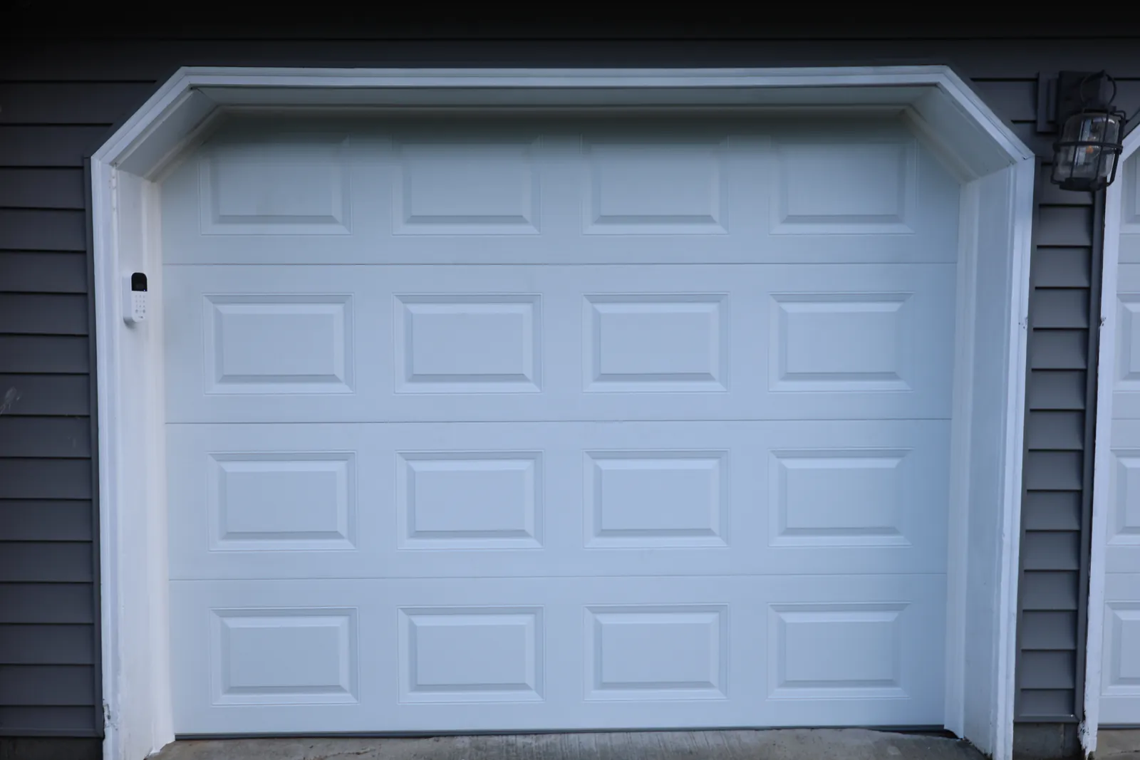 Twin White Doors · Bright Refresh — after, by Bear Door Services